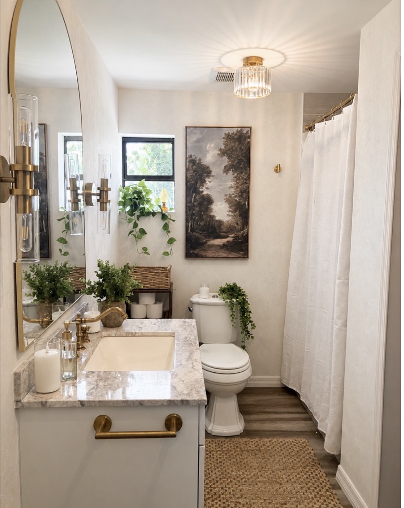 Westwood guest bathroom after the refresh with the new light fixture and towel bar